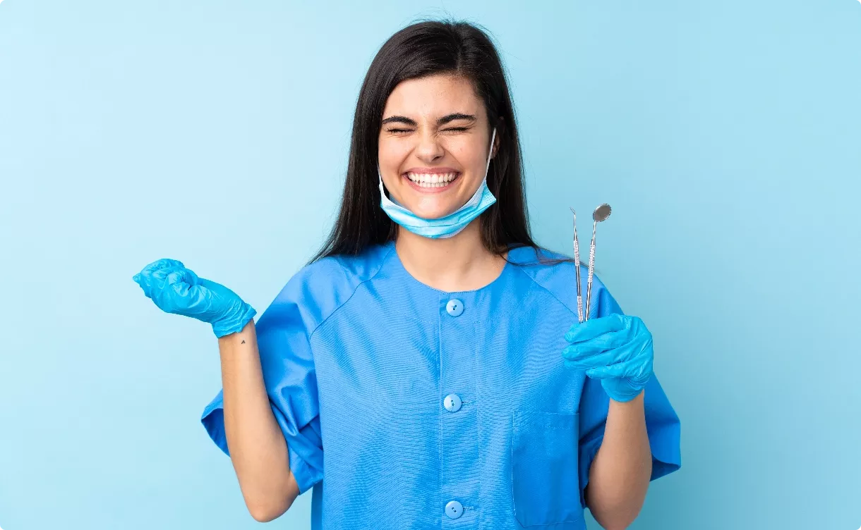 smiling tech with dental instruments