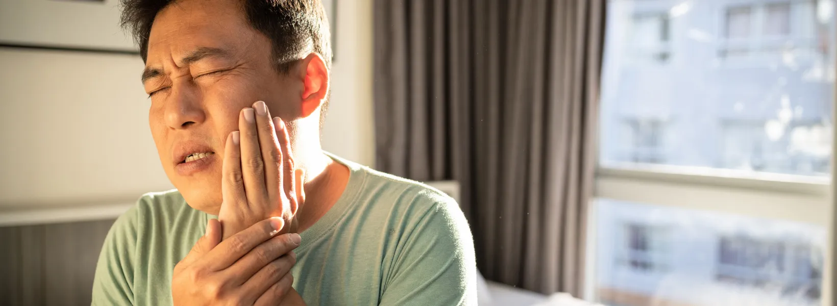 man with tooth pain